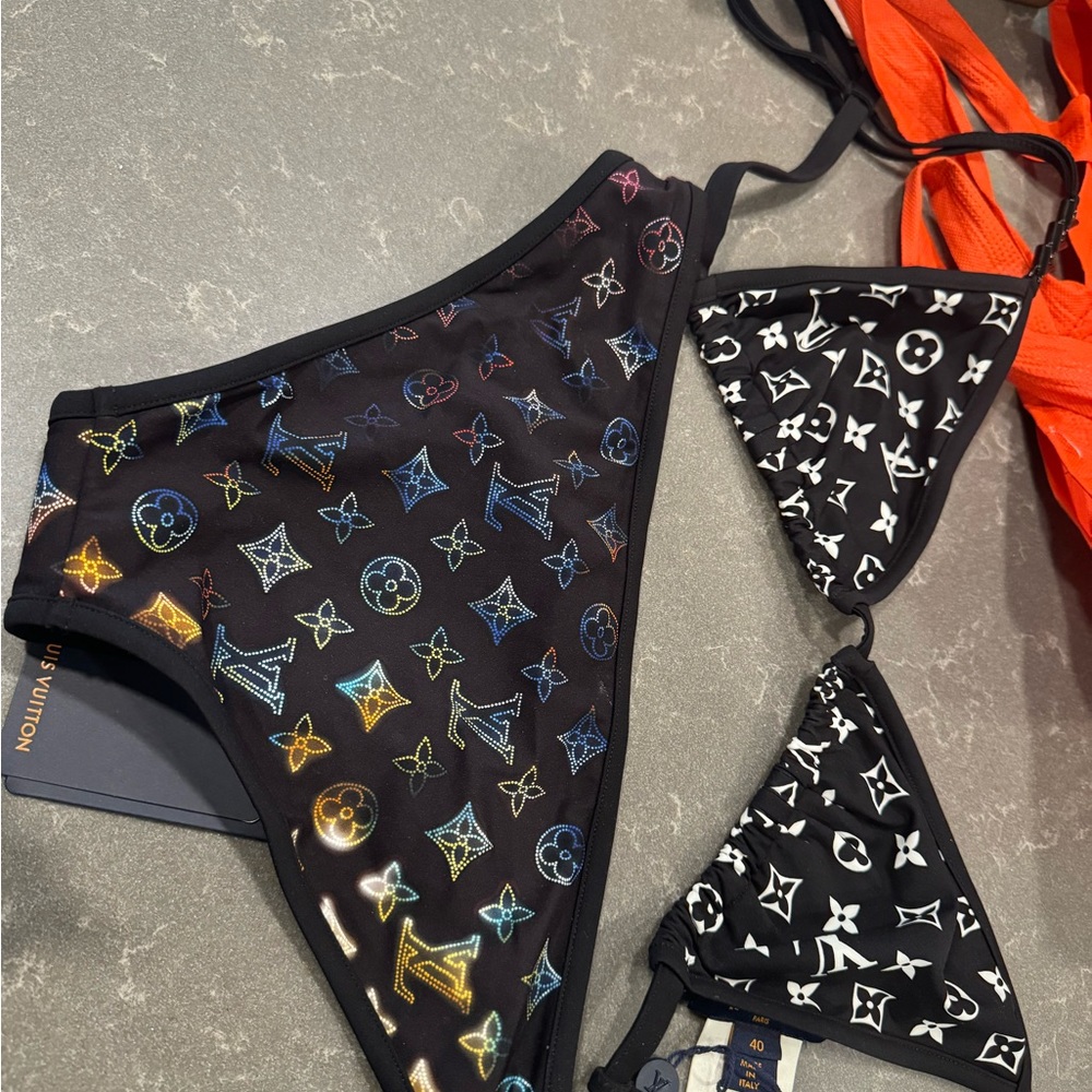 Louis Vuitton bikini set- non matching. Will sell separate if requested.